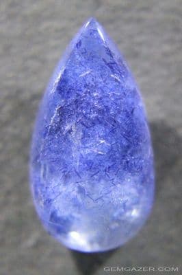 Quartz cabochon with Dumortierite inclusions, Brazil. 5.71 carats.