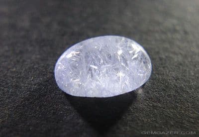 Quartz cabochon with Dumortierite inclusions, Brazil.  9.32 carats.