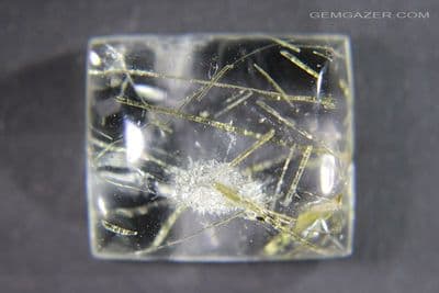 Quartz cabochon with Epidote crystal inclusions, Brazil. 19.85 carats.