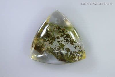 Quartz cabochon with Epidote crystal inclusions, Brazil. 3.53 carats.