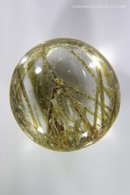 Quartz cabochon with Epidote crystal inclusions, Brazil. 41.86 carats.