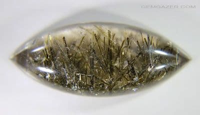 Quartz cabochon with Epidote crystal inclusions, Brazil. 46.92 carats.