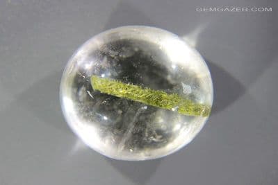 Quartz cabochon with Epidote inclusion, Brazil. 53.22 carats.