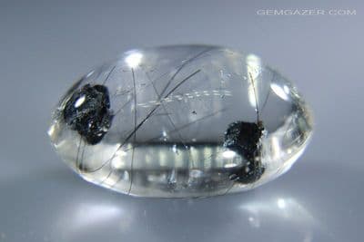 Quartz cabochon with Fuchsite Mica & Rutile inclusions, Brazil. 18.71 carats.
