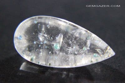 Quartz cabochon with Gilalite inclusions, Brazil.  6.89 carats.