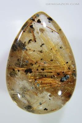 Quartz cabochon with Golden Rutile, Brazil. 55.47 carats.