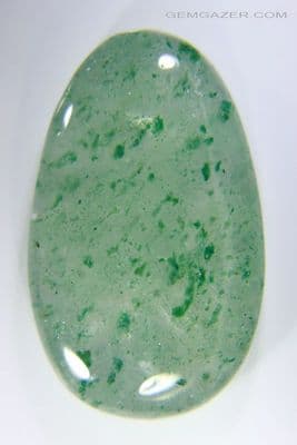 Quartz cabochon with green Fuchsite Mica inclusions, China. 33.50 carats.