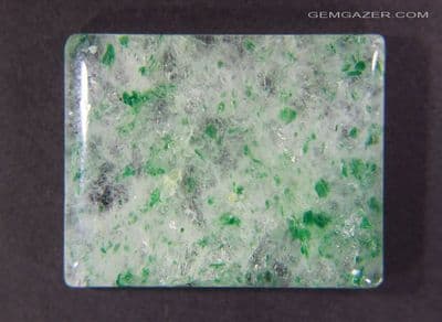 Quartz cabochon with green Fuchsite Mica inclusions, China. 60.82 carats.
