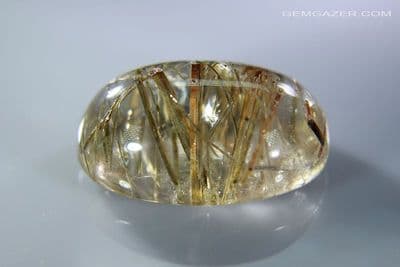 Quartz cabochon with green Tourmaline inclusions, Brazil, 32.77 carats.