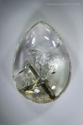 Quartz cabochon with green Tourmaline inclusions, Brazil. 74.63 carats.