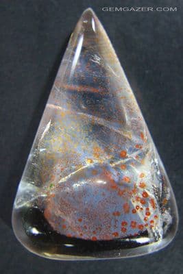 Quartz cabochon with Hematite flower inclusions, Brazil. 51.78 carats.