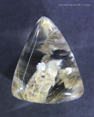 Quartz cabochon with Lodolite (Clay) and Rutile inclusions, Brazil. 15.44 carats.