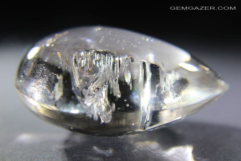Quartz cabochon with negative crystal inclusions Madagascar 282 48 carats
