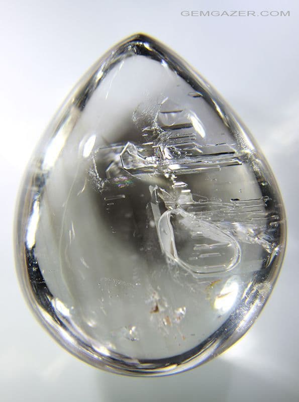 Quartz cabochon with negative crystal inclusions Madagascar 282 48 carats