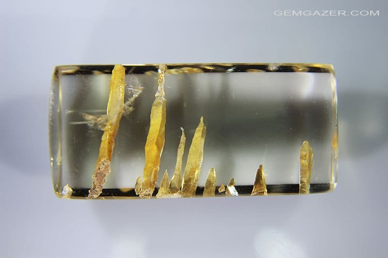 Quartz cabochon with Oxide-coated negative crystal inclusions ...