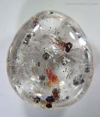 Quartz cabochon with Pyrite crystal inclusions, Brazil.  42.09 carats.
