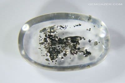 Quartz cabochon with Pyrite inclusions, Brazil. 6.67 carats.