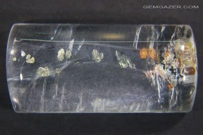 Quartz cabochon with Pyrite  inclusions, Brazil.  88.37 carats.