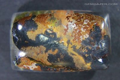 Quartz cabochon with Pyrolusite and Oxide inclusions, Brazil. 38.56 carats.