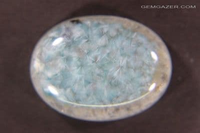 Quartz cabochon with radial Gilalite inclusions, Brazil. 20.70 carats.