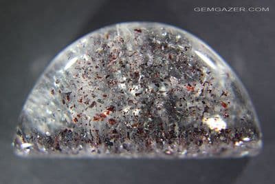 Quartz cabochon with red Hematite inclusions (Lepidocrocite), Madagascar. 75.26 carats.