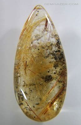 Quartz cabochon with Rutile & Chlorite inclusions, Brazil. 46.05 carats.