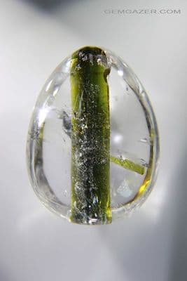 Quartz cabochon with Tourmaline crystal inclusion, Brazil. 50.40 carats. (Video)  ** SOLD **