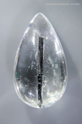 Quartz cabochon with Tourmaline inclusions, Brazil. 34.09 carats.