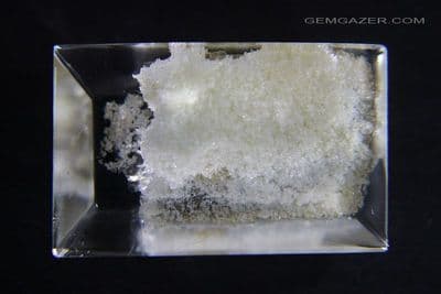 Quartz cabochon with white Chlorite/Lodolite inclusions, Brazil.  36.86 carats.