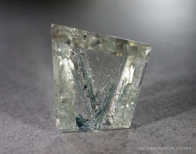 Quartz with blue Tourmaline (Indicolite) inclusions, faceted, Brazl.  44.01 carats.