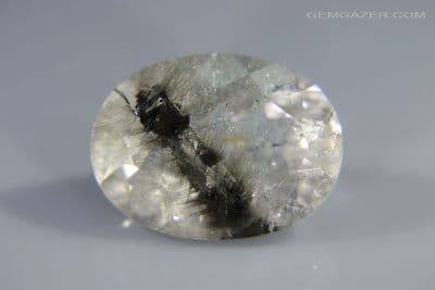 Quartz with Brookite inclusions, faceted, Brazil. 16.51 carats.  (Video)