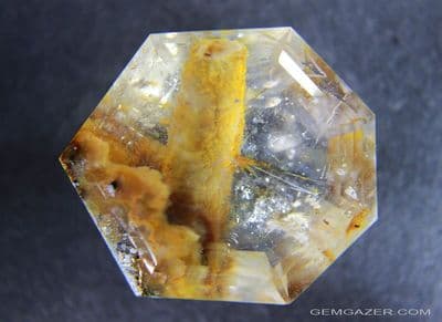 Quartz with Chalcedony tube inclusion, faceted, Madagascar.  83.43 carats.  ** SOLD **