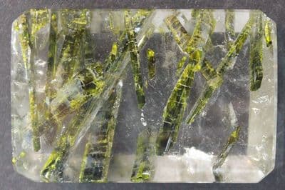 Quartz with Epidote inclusions, cabochon, Brazil.    105.65 carats.