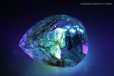 Quartz with fluorescent Petroleum inclusions, faceted, Pakistan. 19.02 carats.