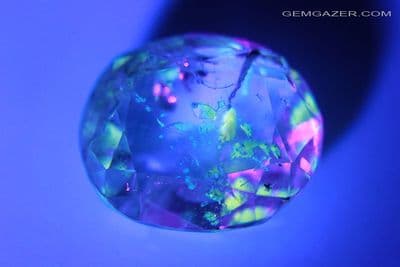 Quartz with fluorescent Petroleum inclusions, faceted, Pakistan. 20.14 carats
