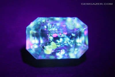 Quartz with fluorescent Petroleum inclusions, faceted, Pakistan.  3.87 carats. (See video)