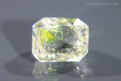 Quartz with fluorescent Petroleum inclusions, faceted, Pakistan. 4.31 carats.