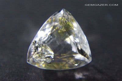 Quartz with fluorescent Petroleum inclusions, faceted, Pakistan. 4.64 carats.