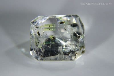 Quartz with fluorescent Petroleum inclusions, faceted, Pakistan. 7.21 carats.