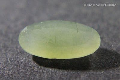 Quartz with Hedenbergite, faceted, Greece.  1.47 carats.