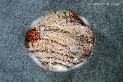 Quartz with Lodolite cabochon, Madagascar. 70.42 carats. (Video)