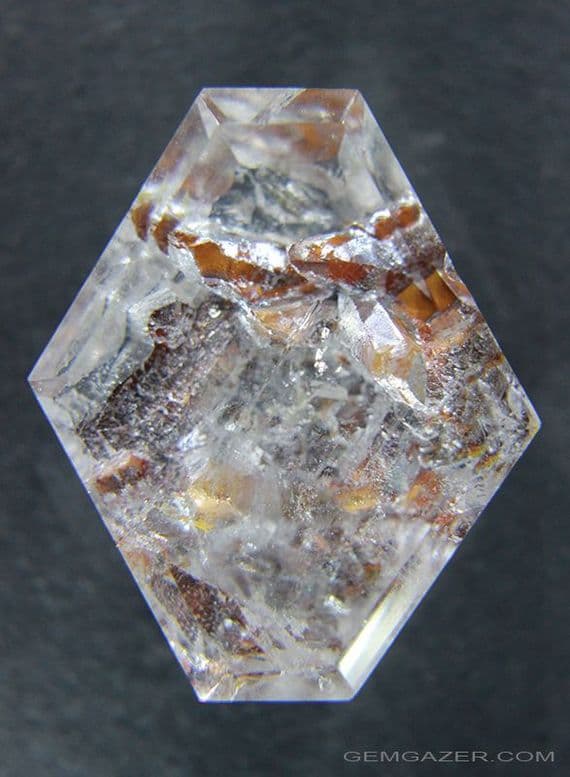 Quartz with oxide-coated positive crystal inclusions, faceted, Brazil.  88.42 carats.