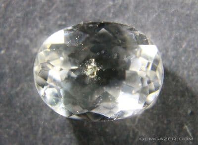 Quartz with Pyrite crystal inclusion, faceted, Brazil.  3.47 carats.