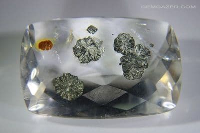 Quartz with Pyrite inclusions, faceted, Brazil. 46.44 carats. (Video)