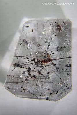 Quartz with Rutile, Hematite and Chloritic Mica inclusions, polished, Brazil.  106.43 carats.