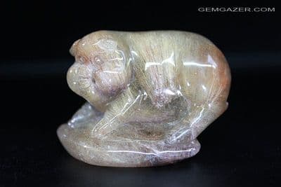 Quartz with Rutile inclusions, carved pig figurine, Brazil. 62.75 grams / 313.73 carats.