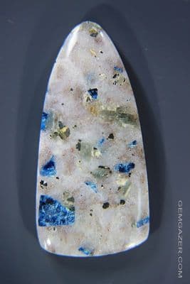 Quartzite cabochon with Lazulite & Pyrite, Switzerland. 23.84 carats.