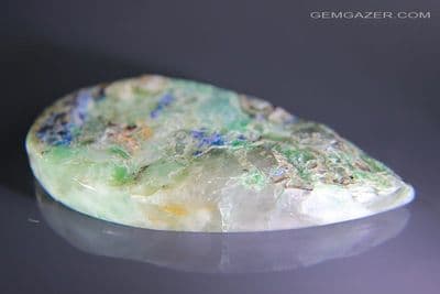 Quartzite cabochon with Linarite and Brochantite, Namibia. 111.04 carats.