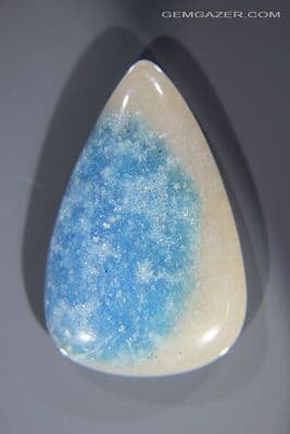 Quartzite cabochon with Trolleite and Lazulite, Brazil, 95.39 carats.