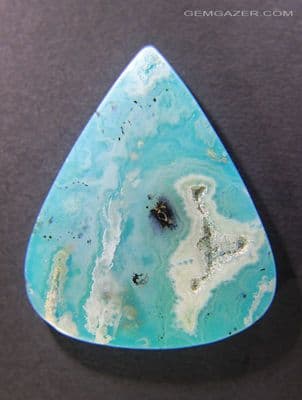 Regency Plume Agate and reconstituted Turquoise doublet cabochon. 25.79 carats.